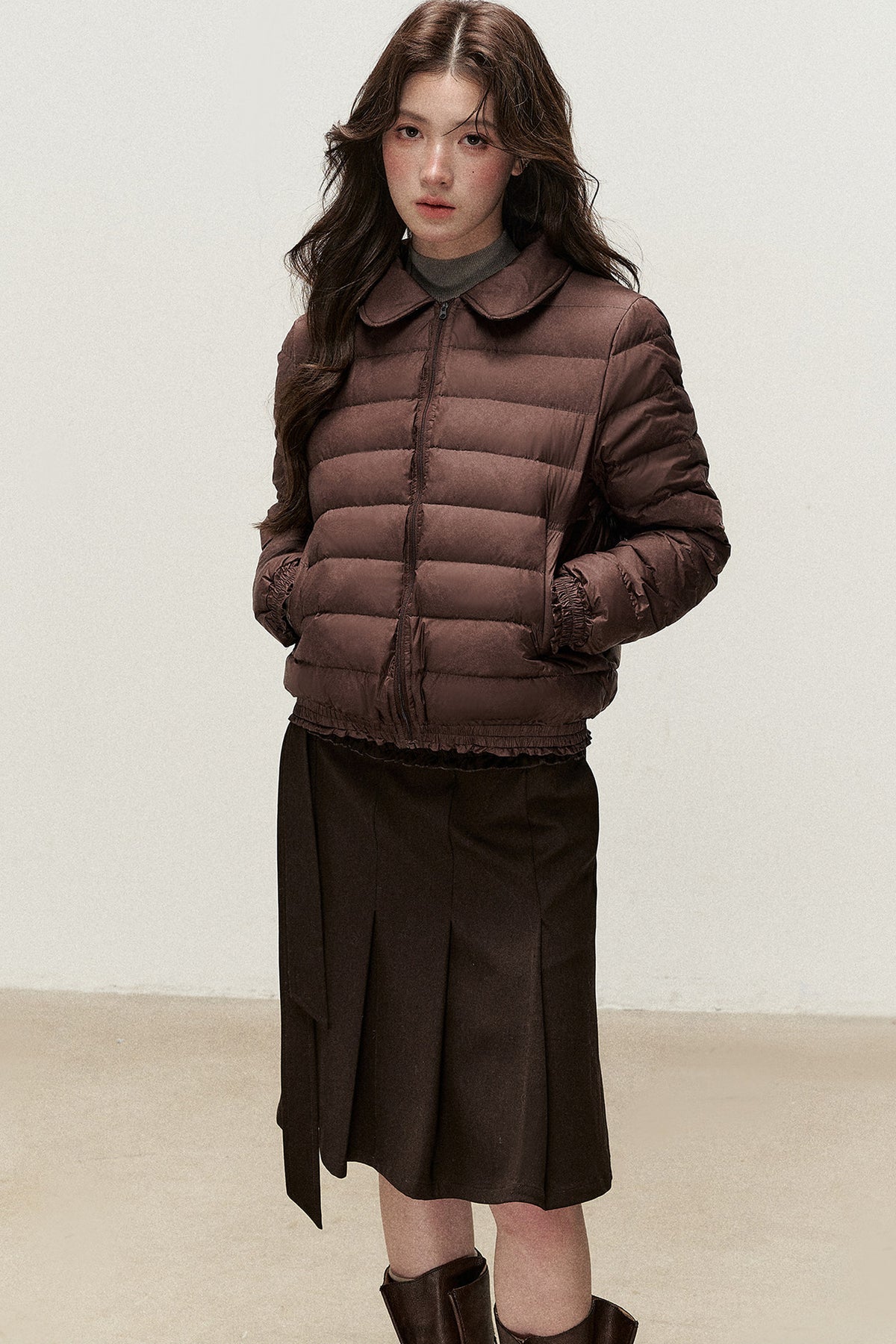 Wendbare Daunenjacke aus Cord mit Bubikragen