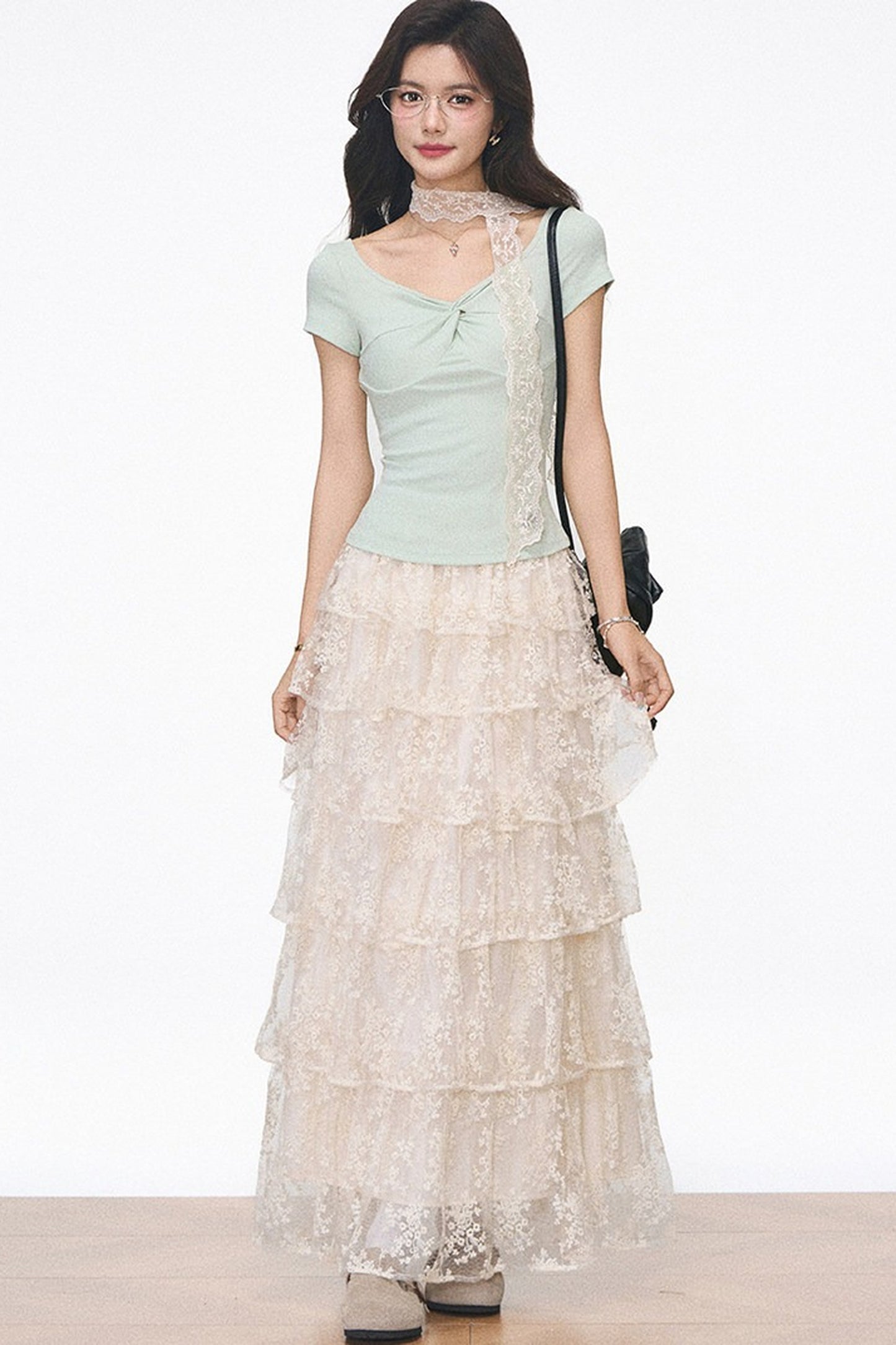 Conjunto coordinado de top y falda de encaje de punto