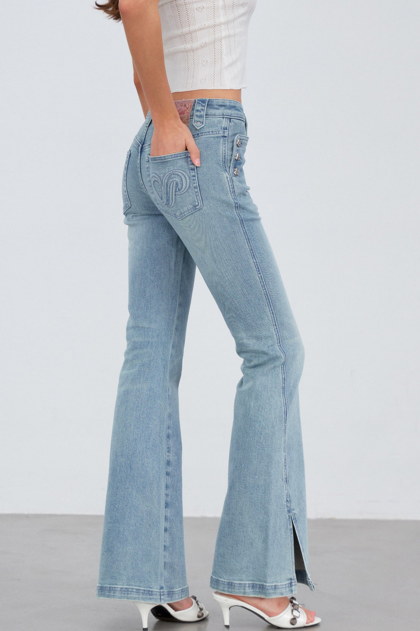 Heart Button Slit Flared Jeans