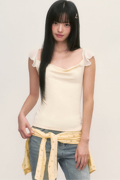 Top con cuello drapeado y mangas con volantes