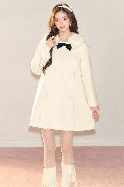 Manteau en laine avec nœud en velours