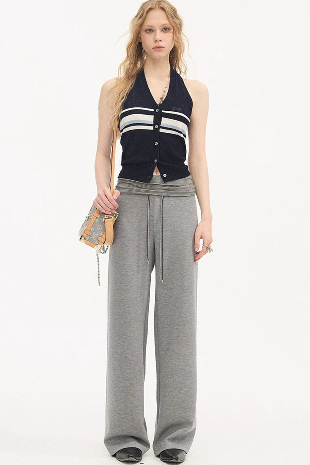 Pantalones casuales slim de cintura alta