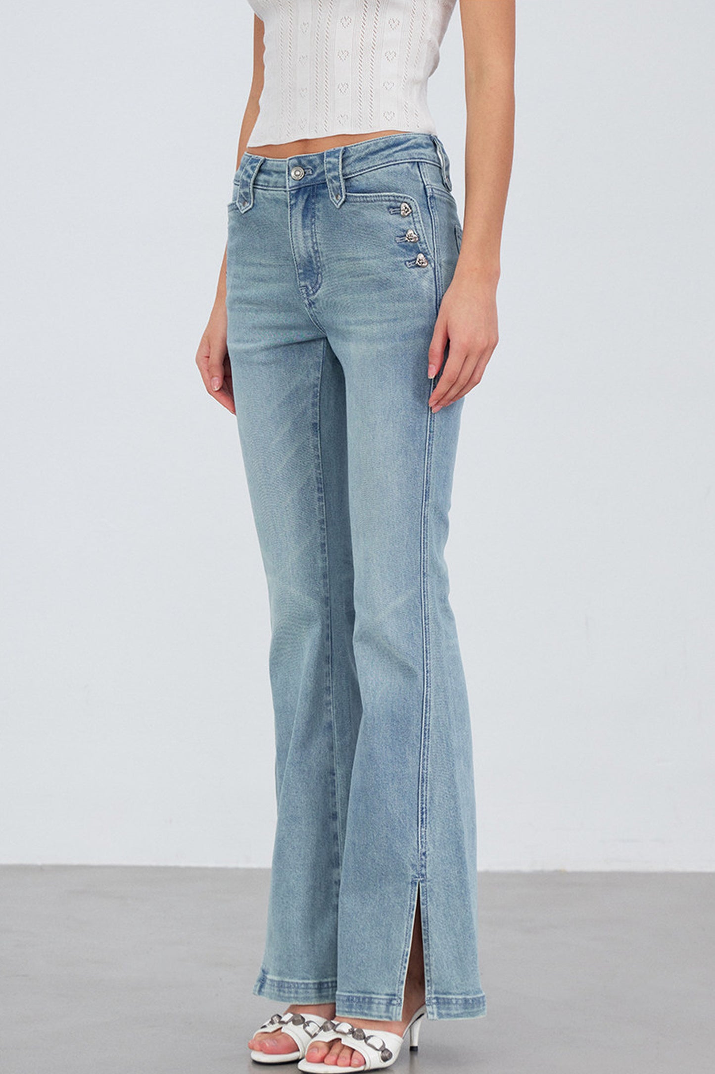 Heart Button Slit Flared Jeans