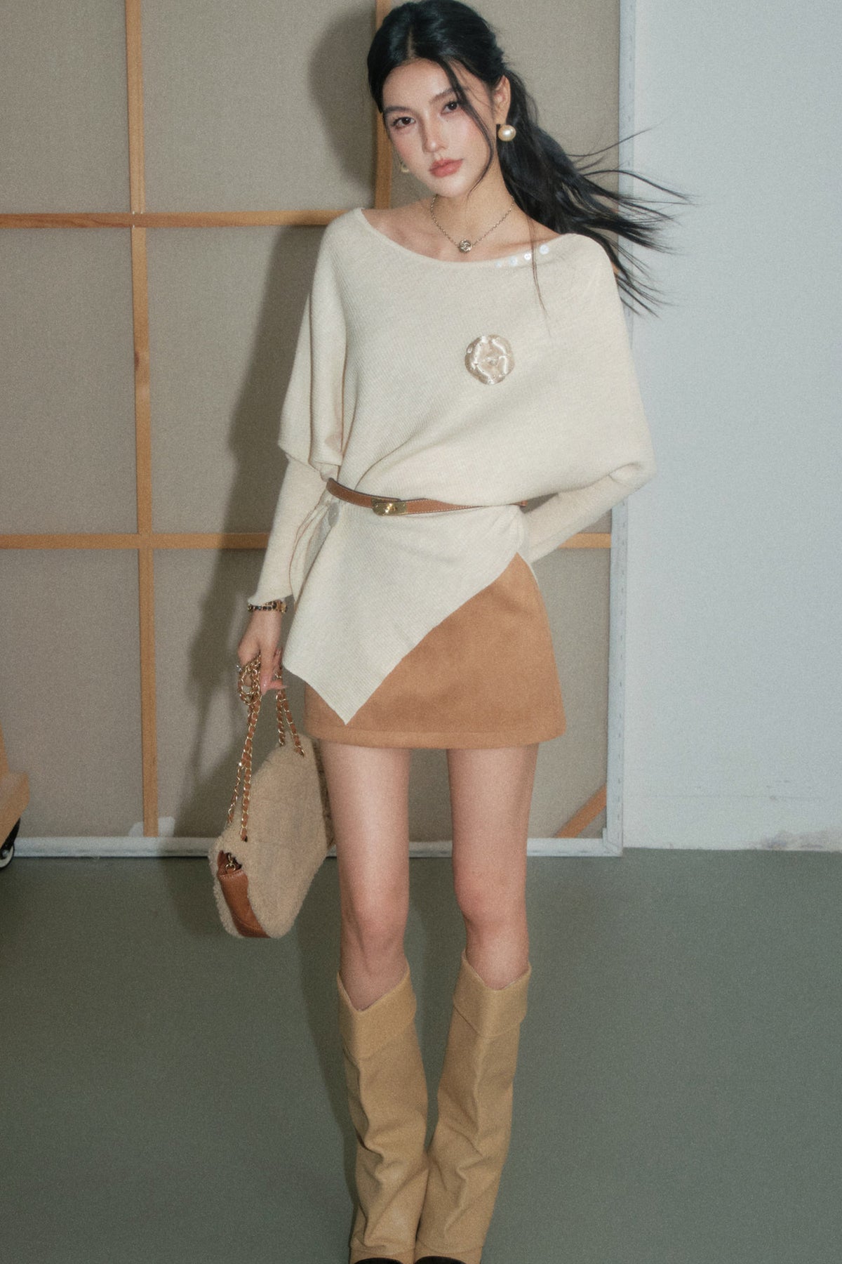 Completo top a maglia irregolare in lana beige