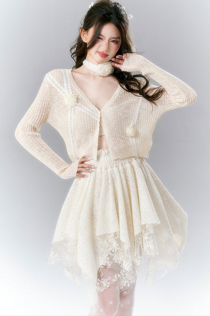 Pompon-Strickjacke
