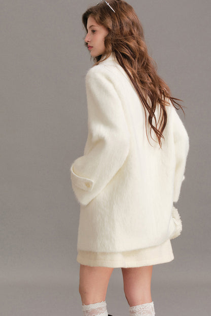 Manteau mi-long en laine imitation vison à épaules tombantes