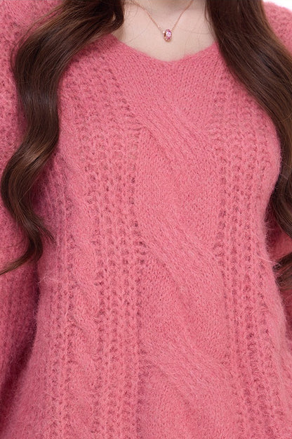 Pull ample en maille torsadée à col V