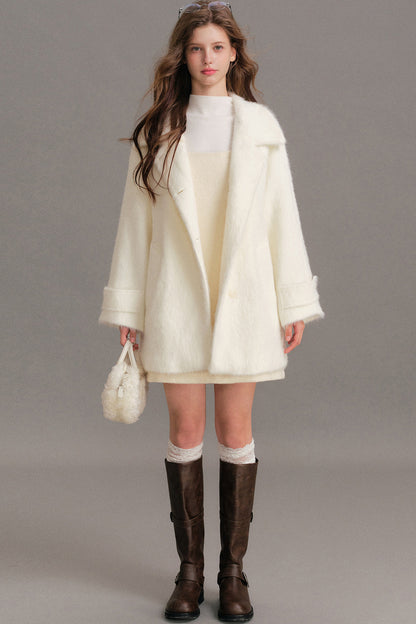 Manteau mi-long en laine imitation vison à épaules tombantes