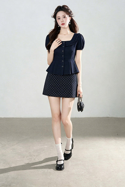 Ensemble chemise à manches courtes et jupe à pois