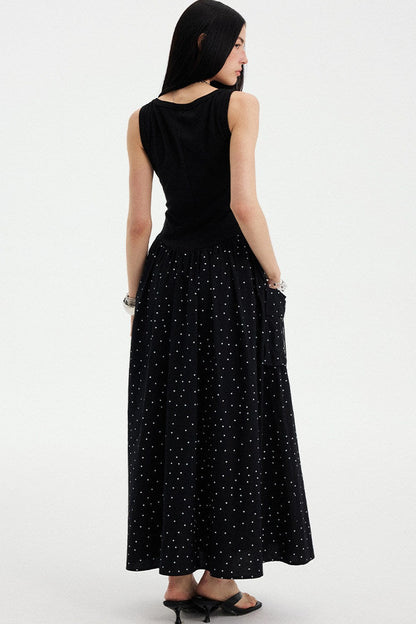 Vestido maxi evasé sin mangas de lunares