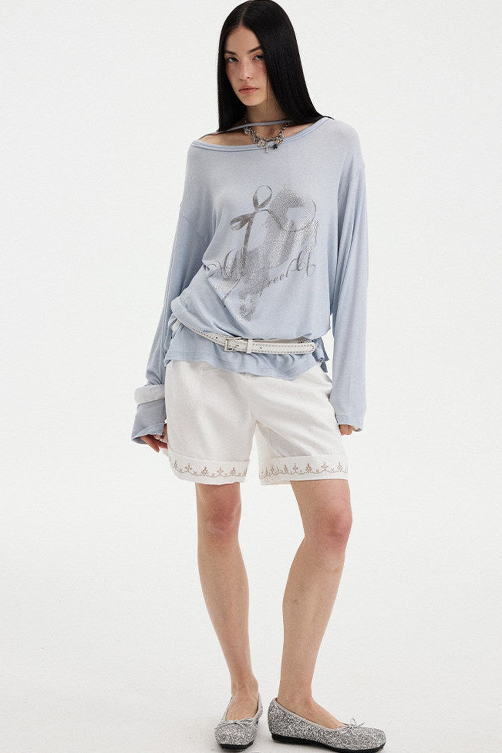 Top con strass effetto distressed con spalle scoperte