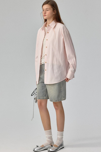 Blusa a rayas con textura y hombros caídos