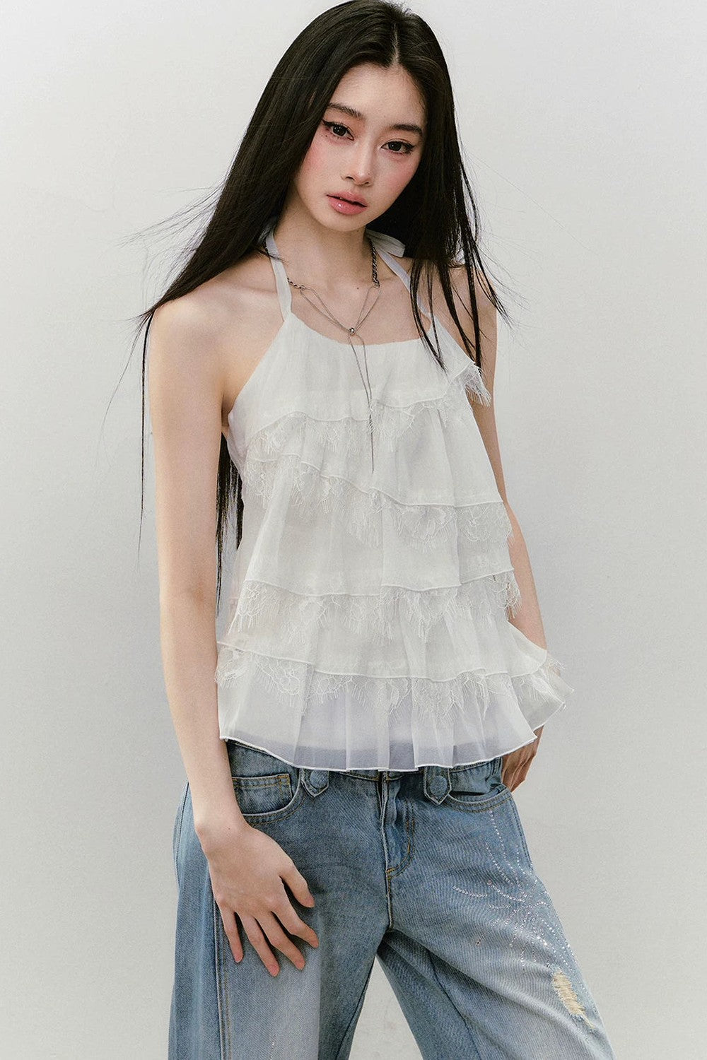 Top dos-nu patchwork en dentelle