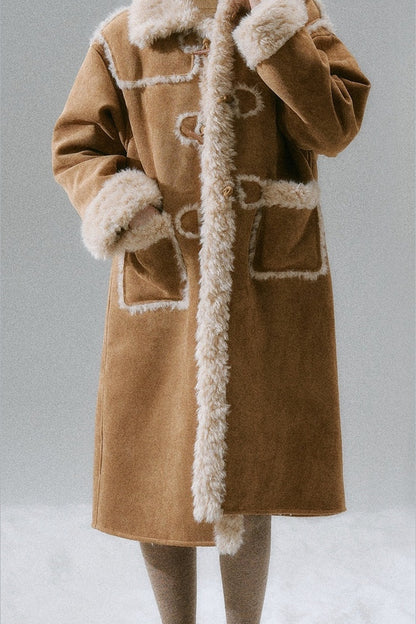 Manteau long à boutons en corne