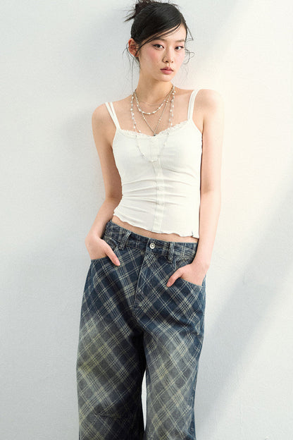Pantaloni in denim a quadri sfumati