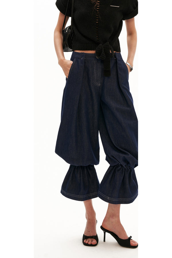 Jeans de denim con puños con volantes y silueta linterna