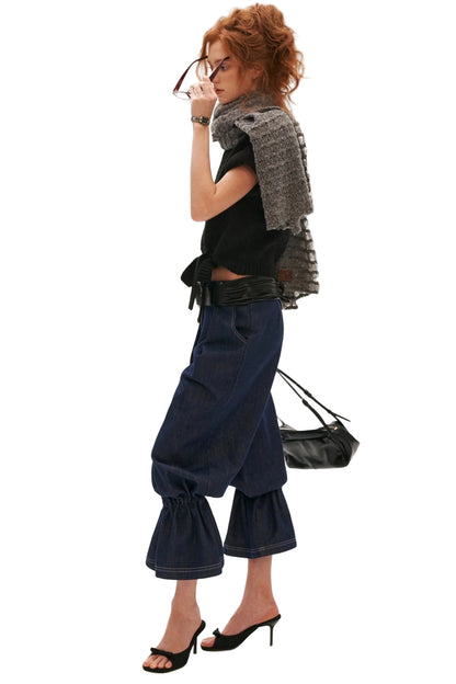 Jeans in denim a lanterna con orli a volant