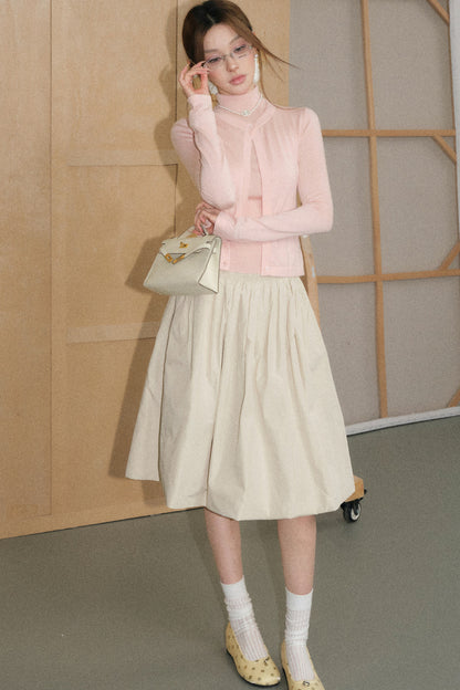 Ensemble cardigan, jupe et pull en laine rose