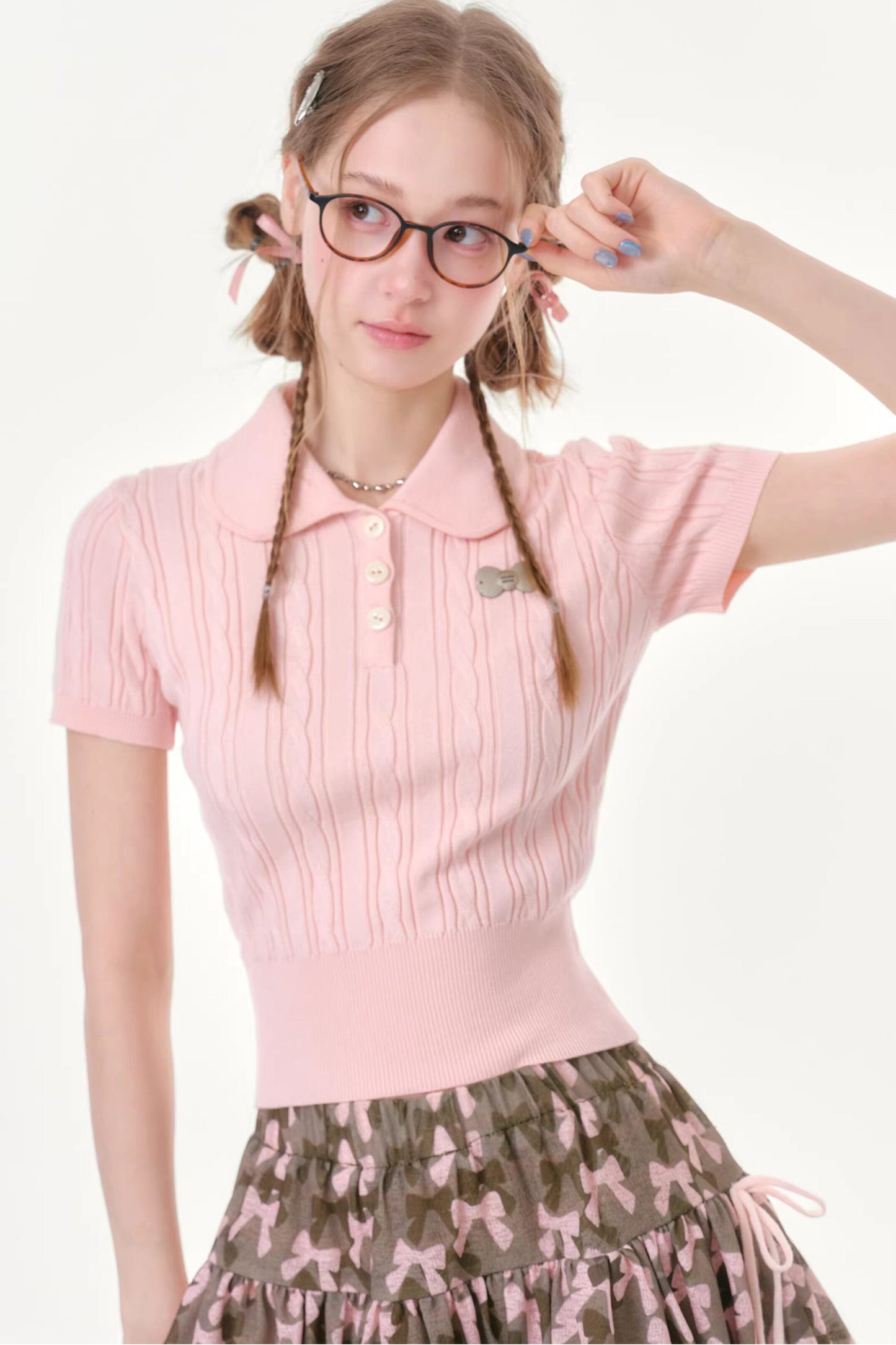Tee-shirt en maille rose à douce torsade