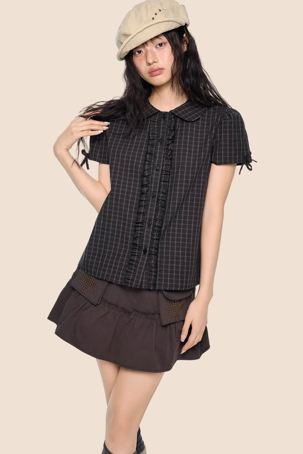 Camicia a righe con fiocco plissettato