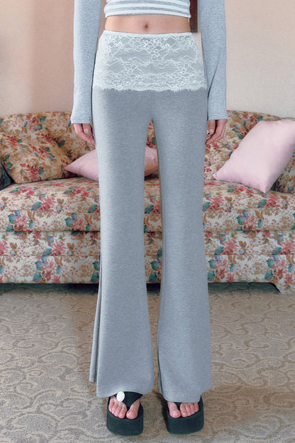 Pantaloni svasati a vita bassa grigi con inserti in pizzo