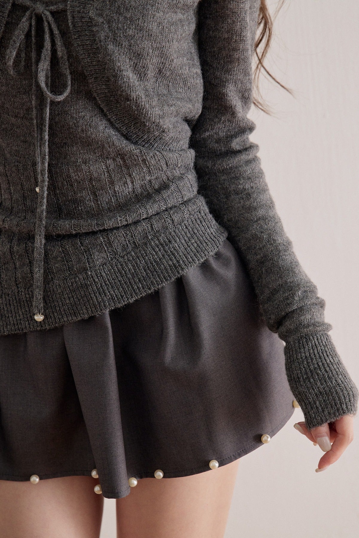 Long-Sleeve V-Neck Lace-Up Knit Sweater