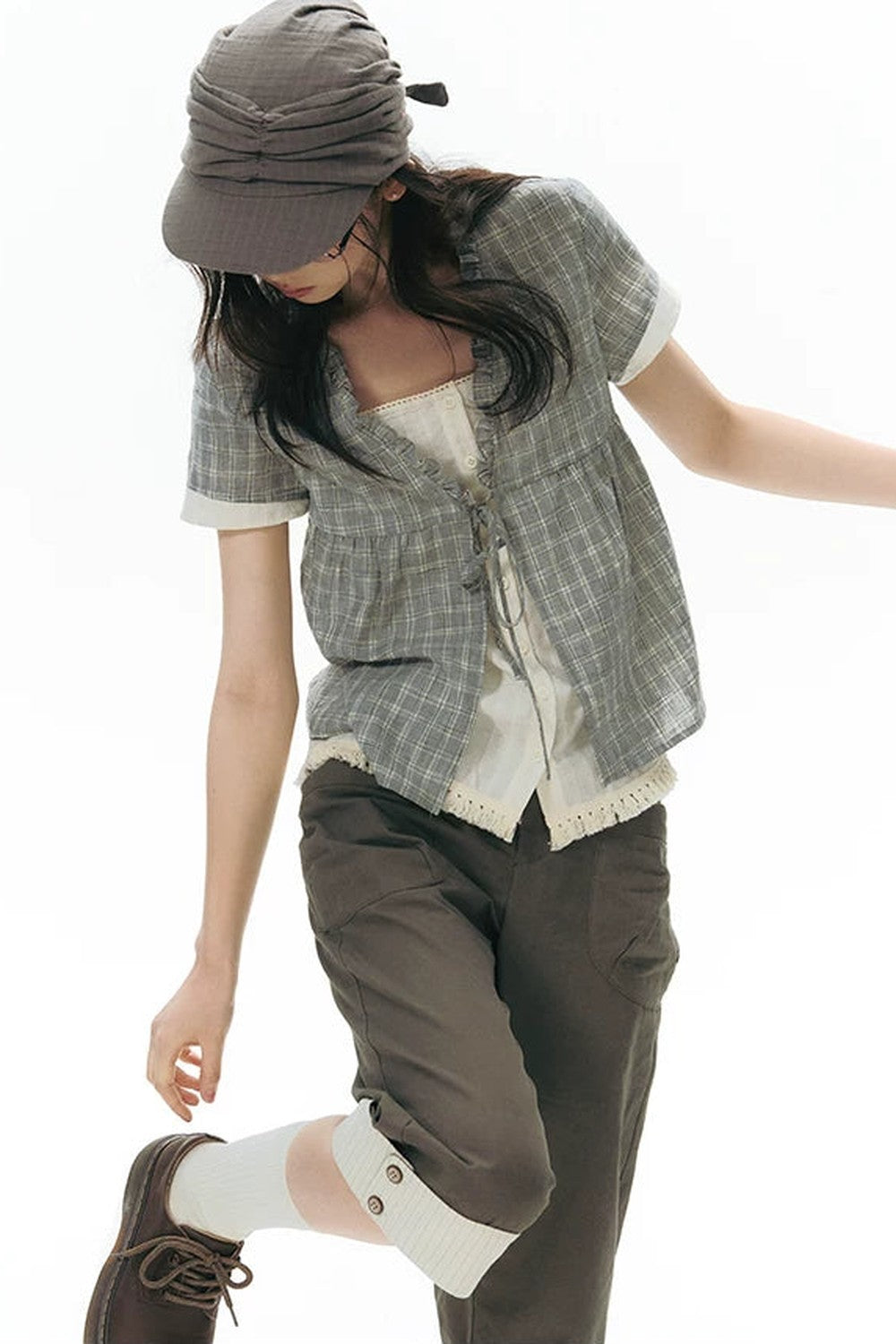 Camicia a quadri con volant e scollo a V