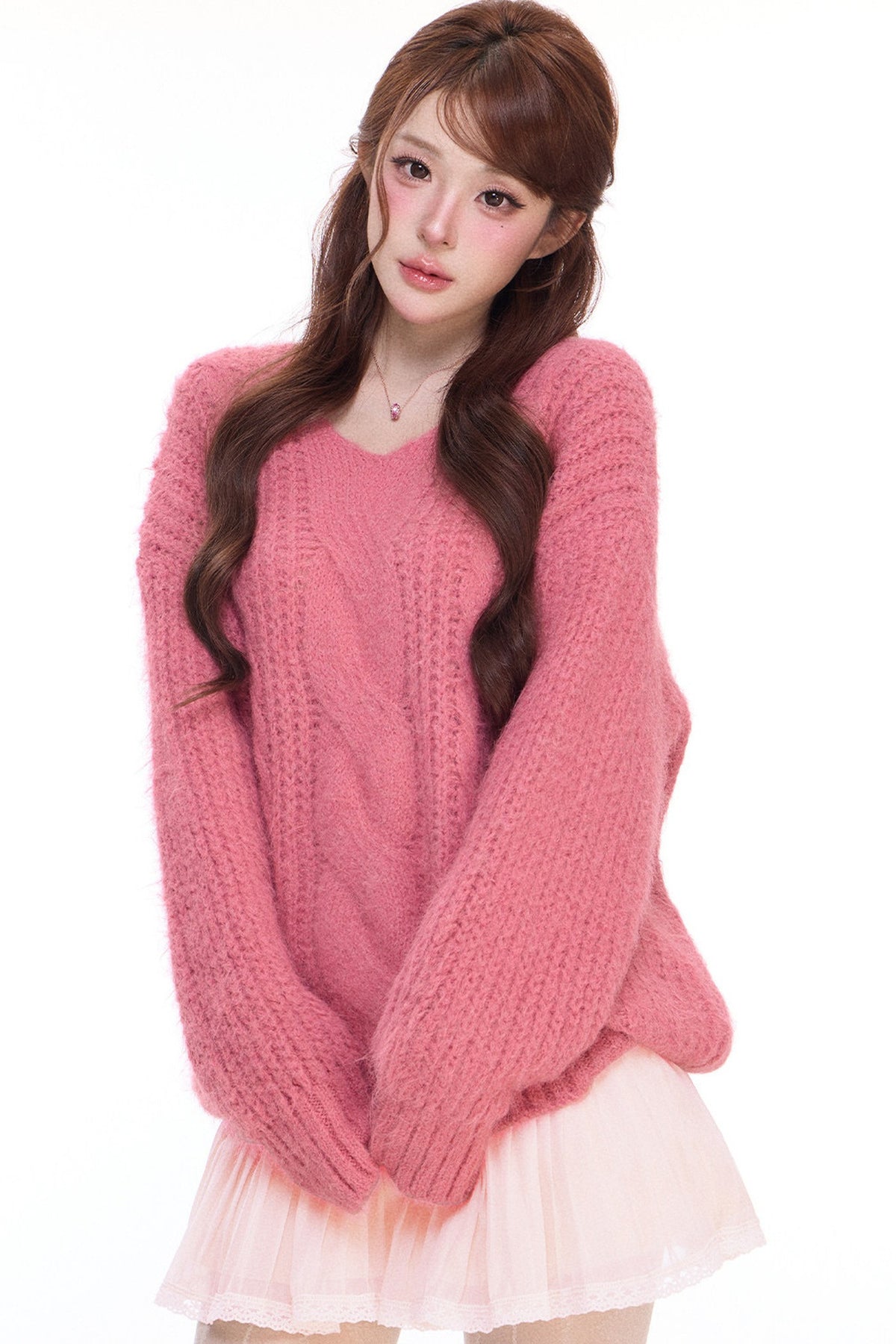 Pull ample en maille torsadée à col V