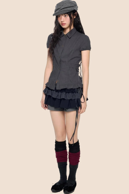 Blouse à manches bouffantes avec lacets
