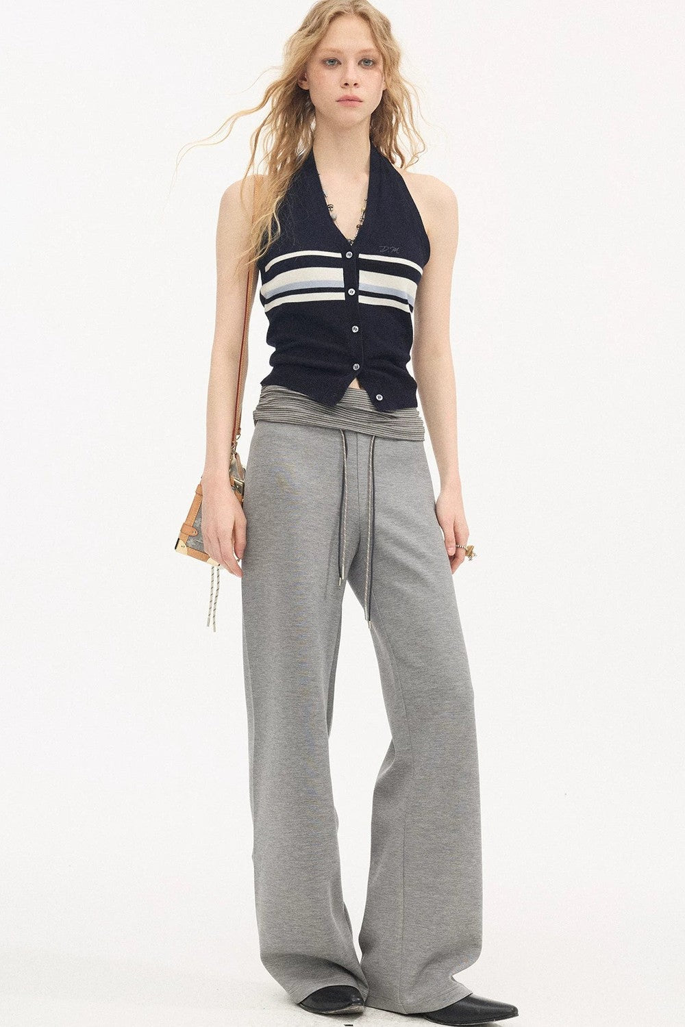 Pantalones casuales slim de cintura alta