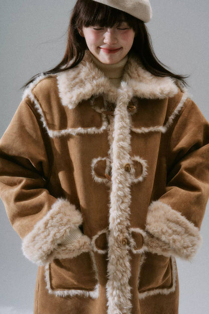 Manteau long à boutons en corne