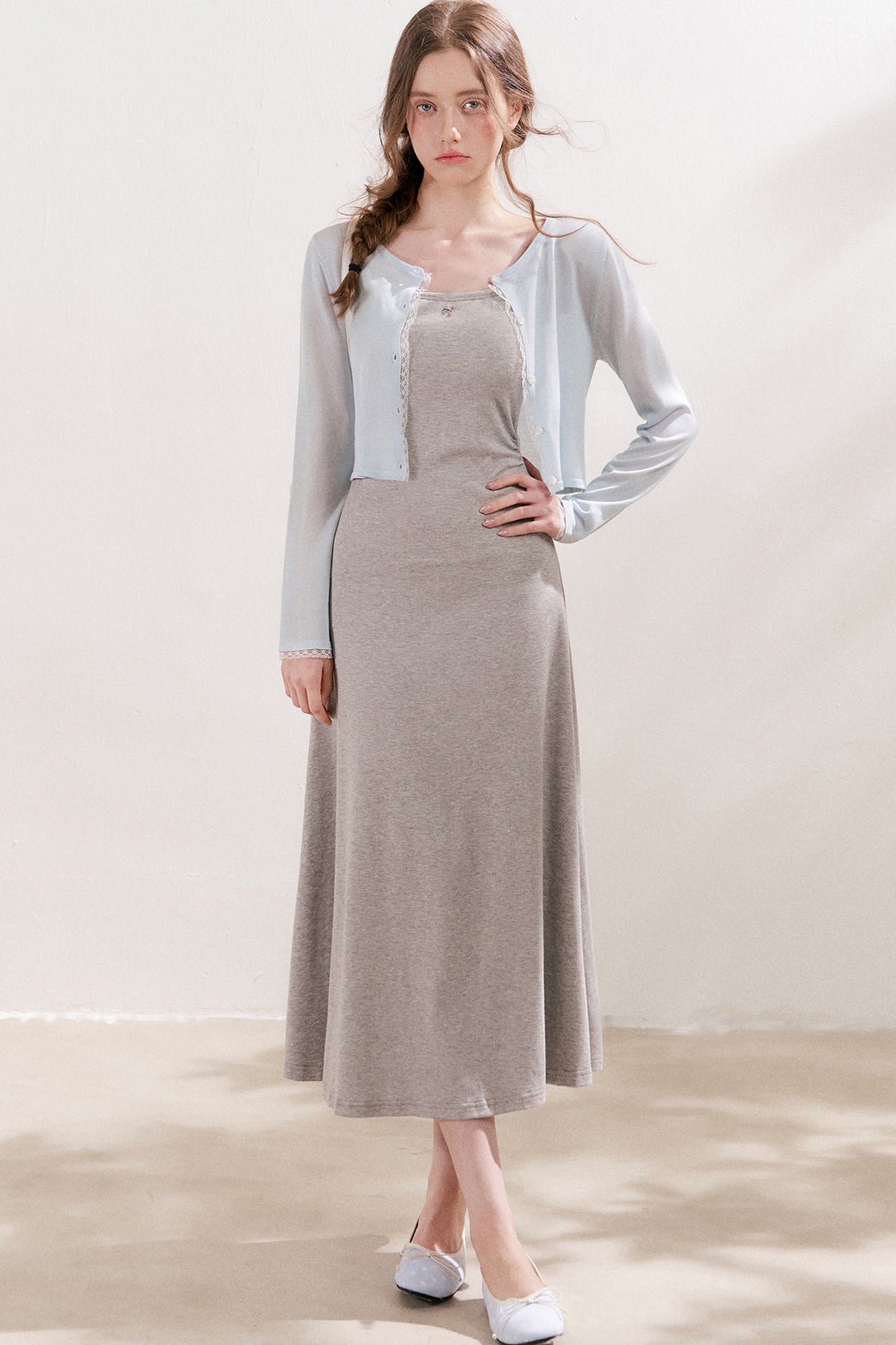 Cardigan in maglia trasparente 100% Lyocell con bordo in pizzo