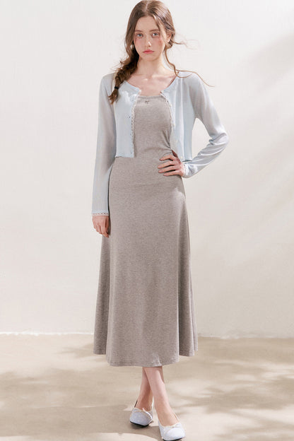 Cardigan in maglia trasparente 100% Lyocell con bordo in pizzo