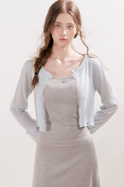 Cardigan in maglia trasparente 100% Lyocell con bordo in pizzo