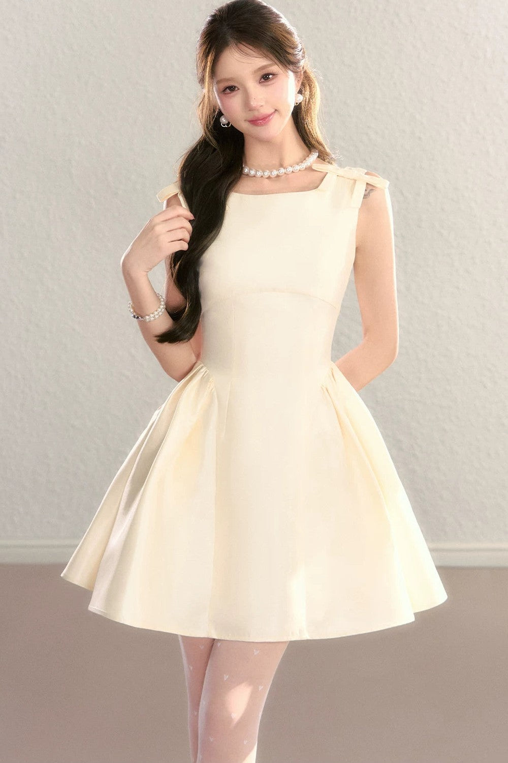 French Sleeveless Cinched Dress