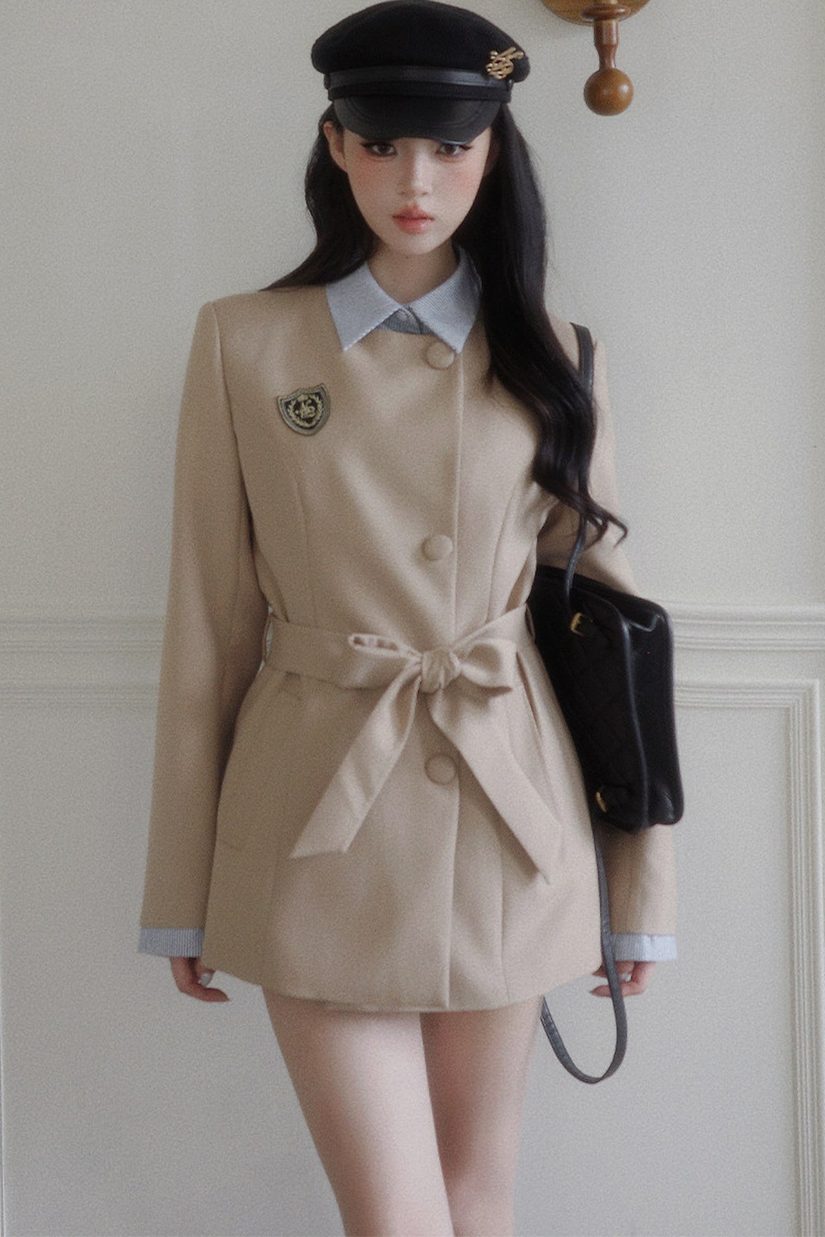 Blazer à nœud cintrant la taille