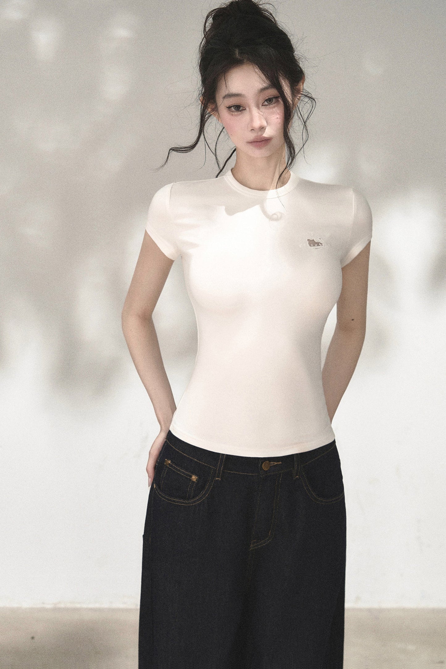 Top in maglia traforata ricamata