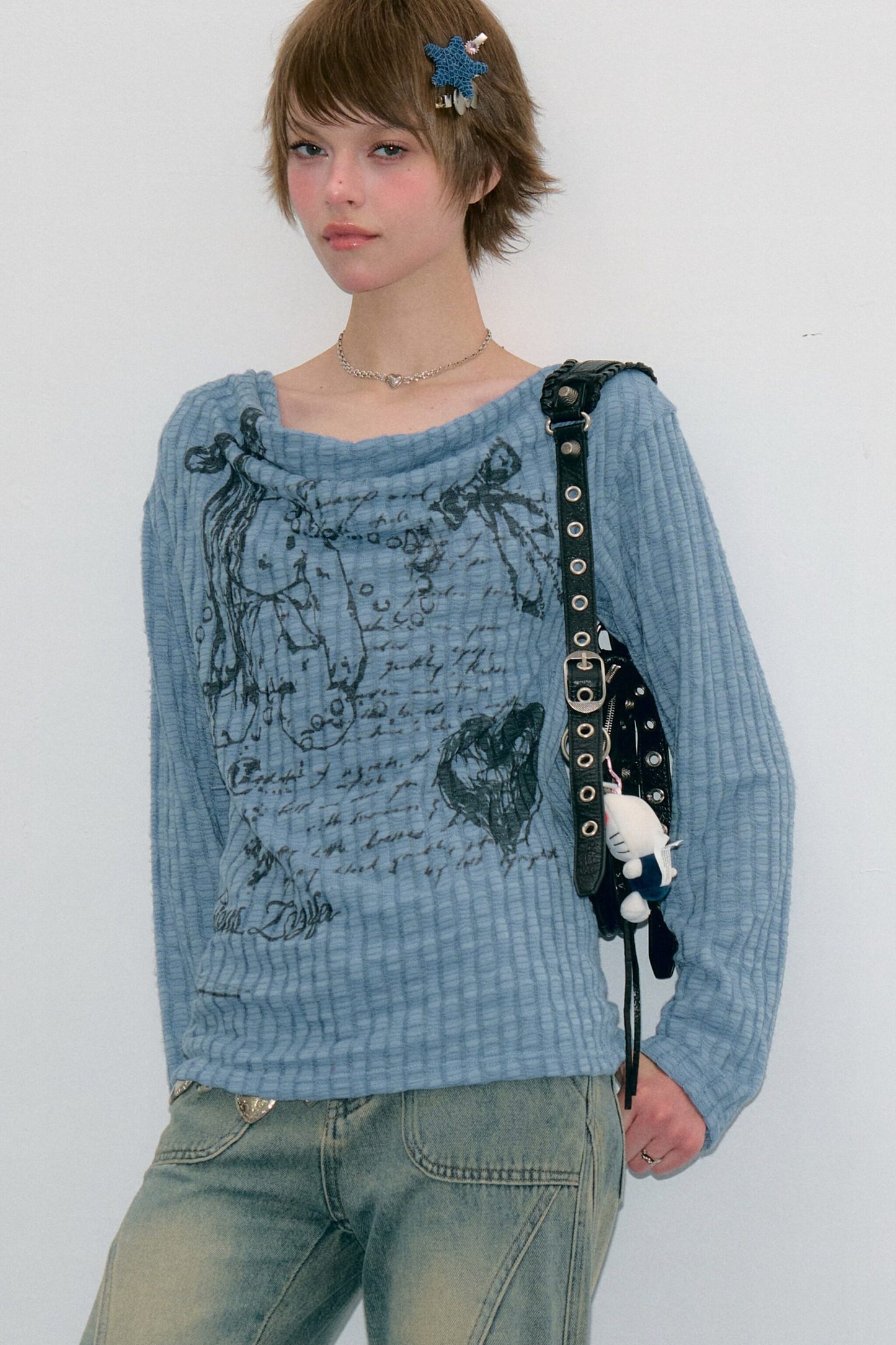Blusa in maglia con graffiti di conigli