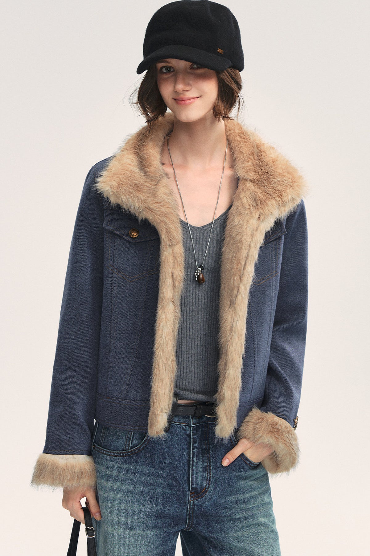 Jeansblaue Patchwork-Jacke mit Fellrevers