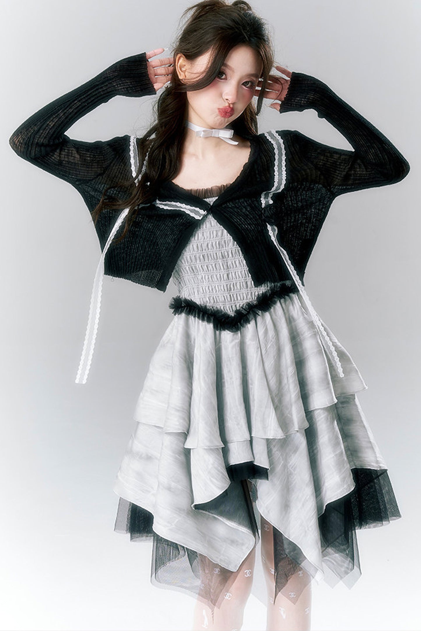 Pompon-Strickjacke