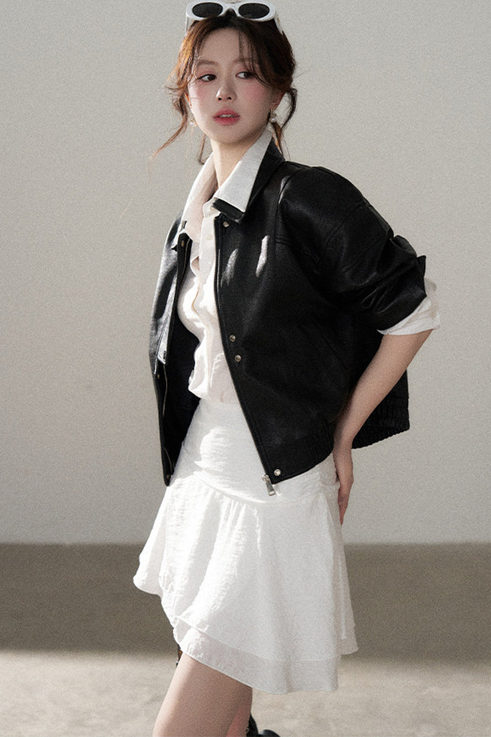 Giacca corta in pelle PU con revers