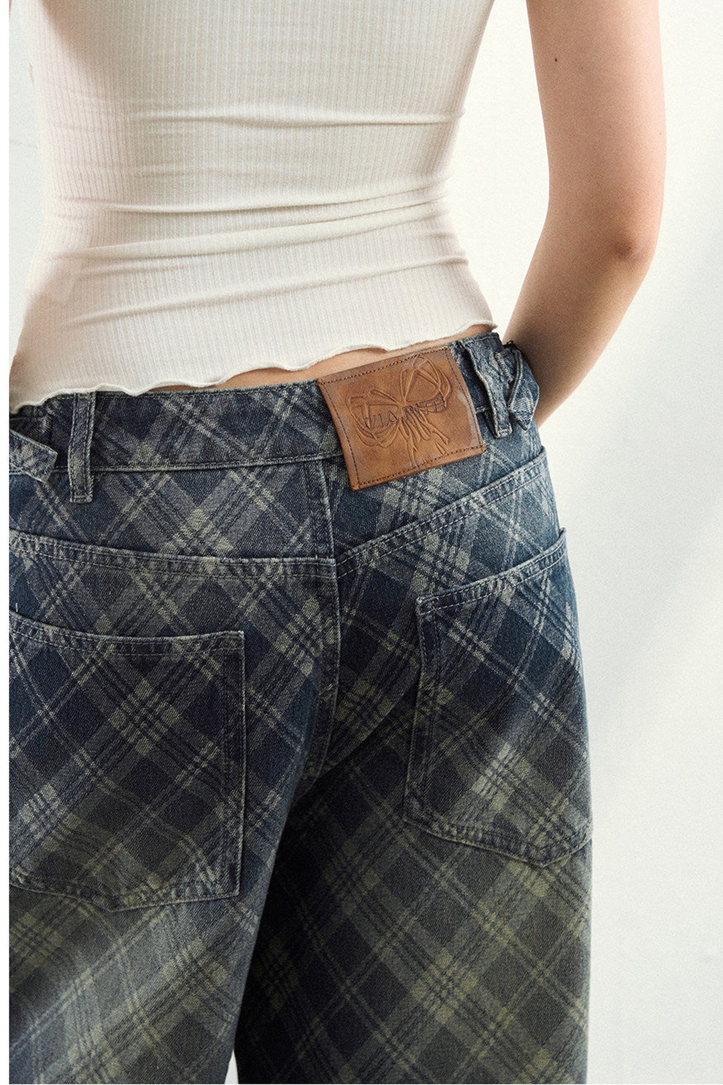 Pantaloni in denim a quadri sfumati