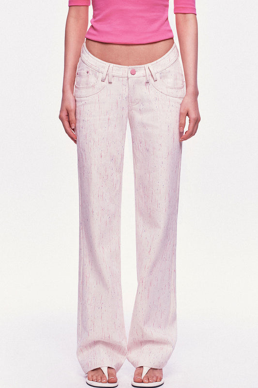 Ausgestellte Low-Waist-Jeans aus reiner Baumwolle mit Pastell-Punkten