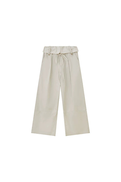 Pantalon droit à rayures et empiècements