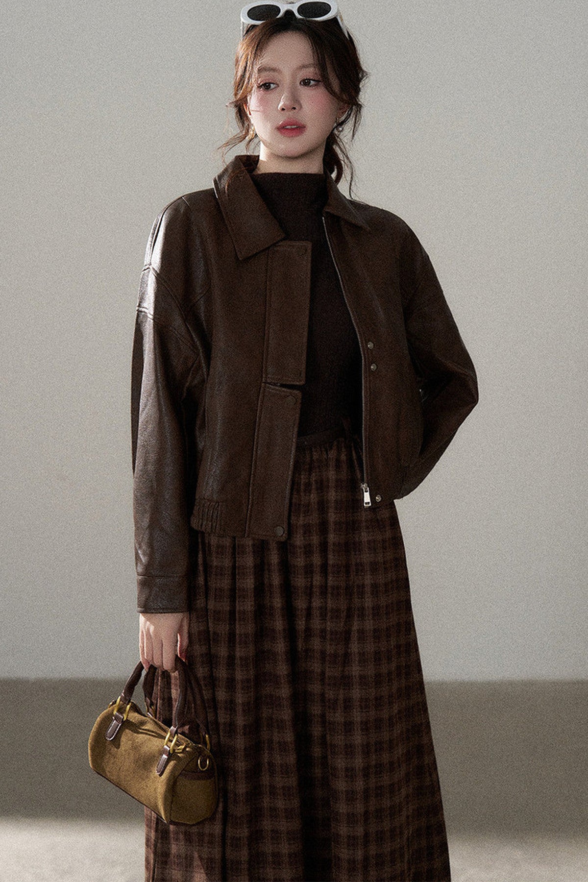 Giacca corta in pelle PU con revers