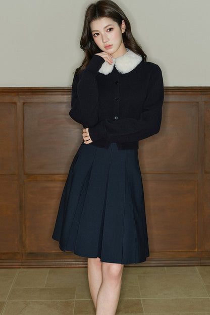 Cardigan en maille à col en fourrure contrastante