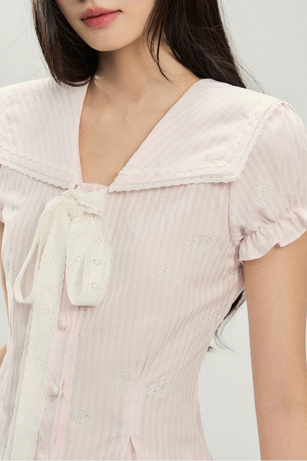 Set estivo rosa a due pezzi con fiocco