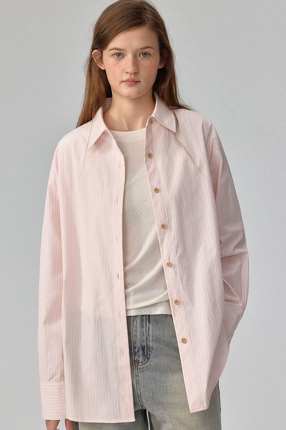Blusa a rayas con textura y hombros caídos