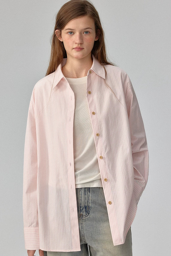 Blusa a rayas con textura y hombros caídos
