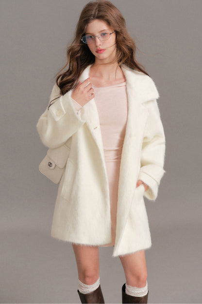 Manteau mi-long en laine imitation vison à épaules tombantes